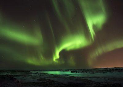 Nordlyset danser over himlen - på Reykjanes-halvøen